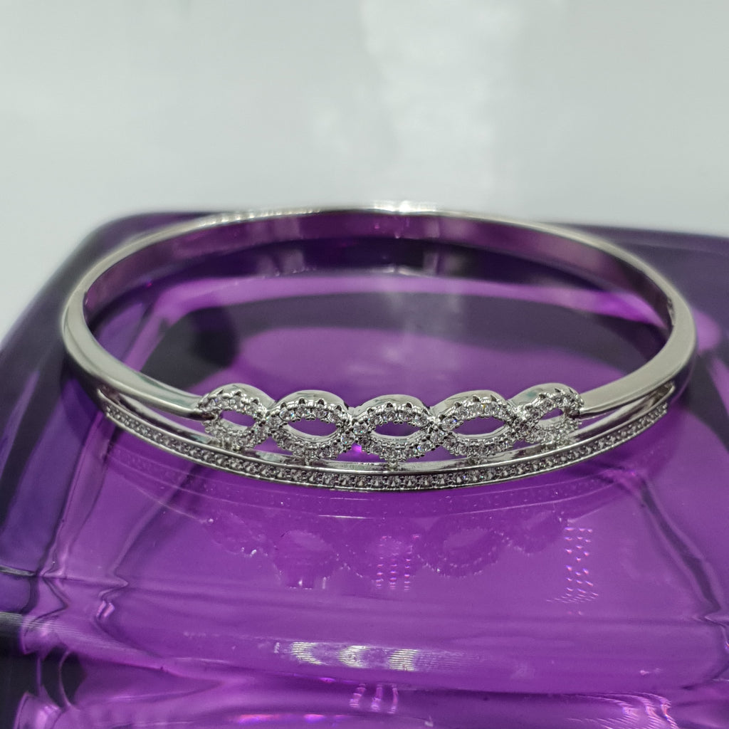 BRAZALETE DE BAÑO DE RODIO MOD LIRIO